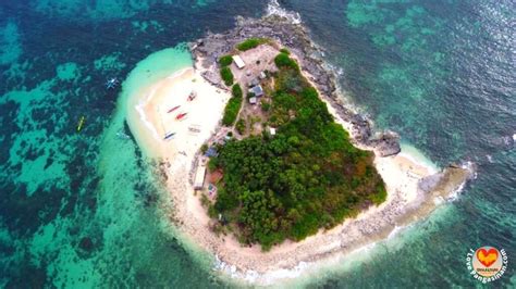 TAMBOBONG BEACH + COLIBRA ISLAND in Dasol, .